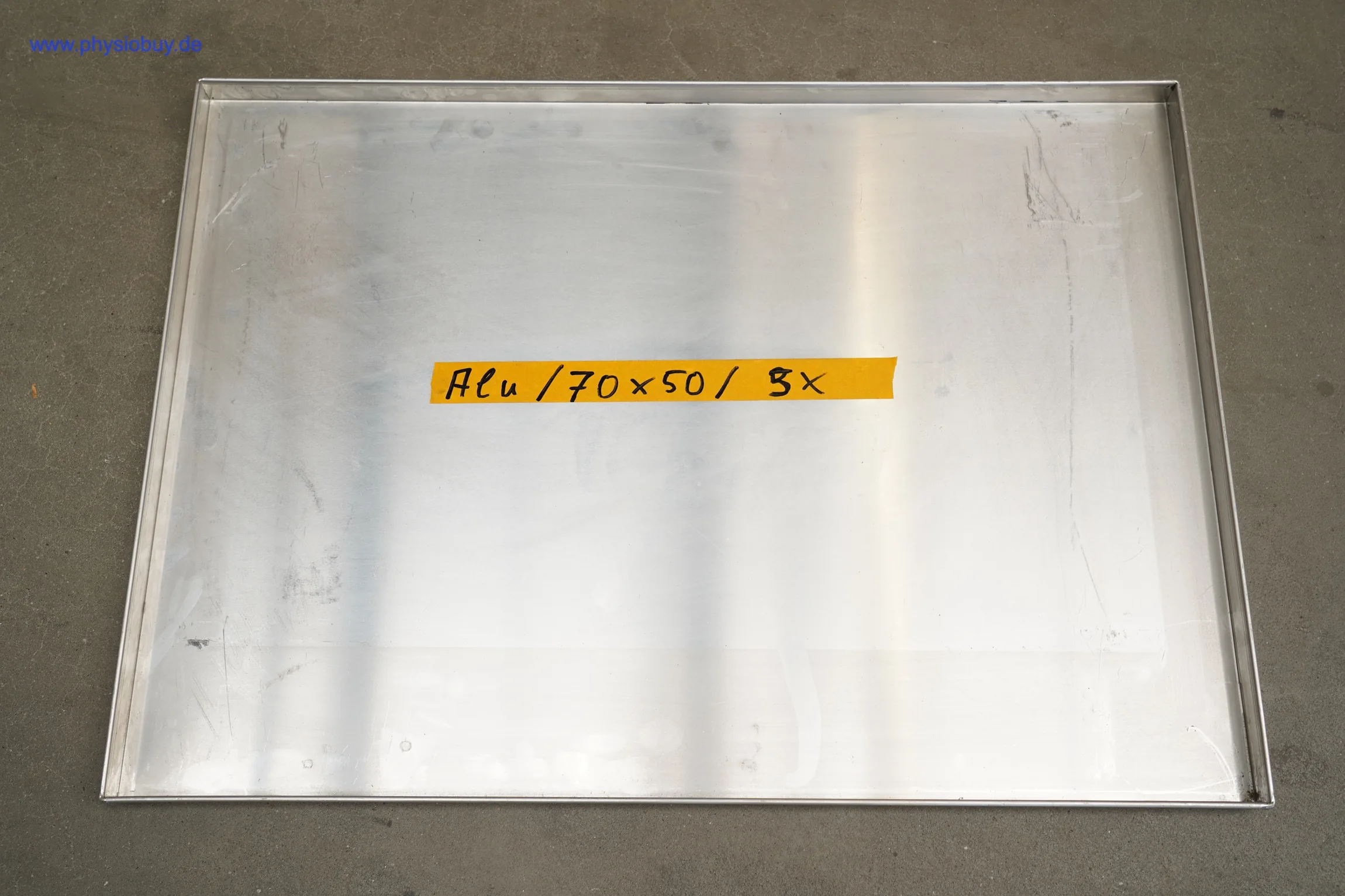 Warmhalteschrankblech aus Aluminium mit handschriftlichem Vermerk Alu 70x50