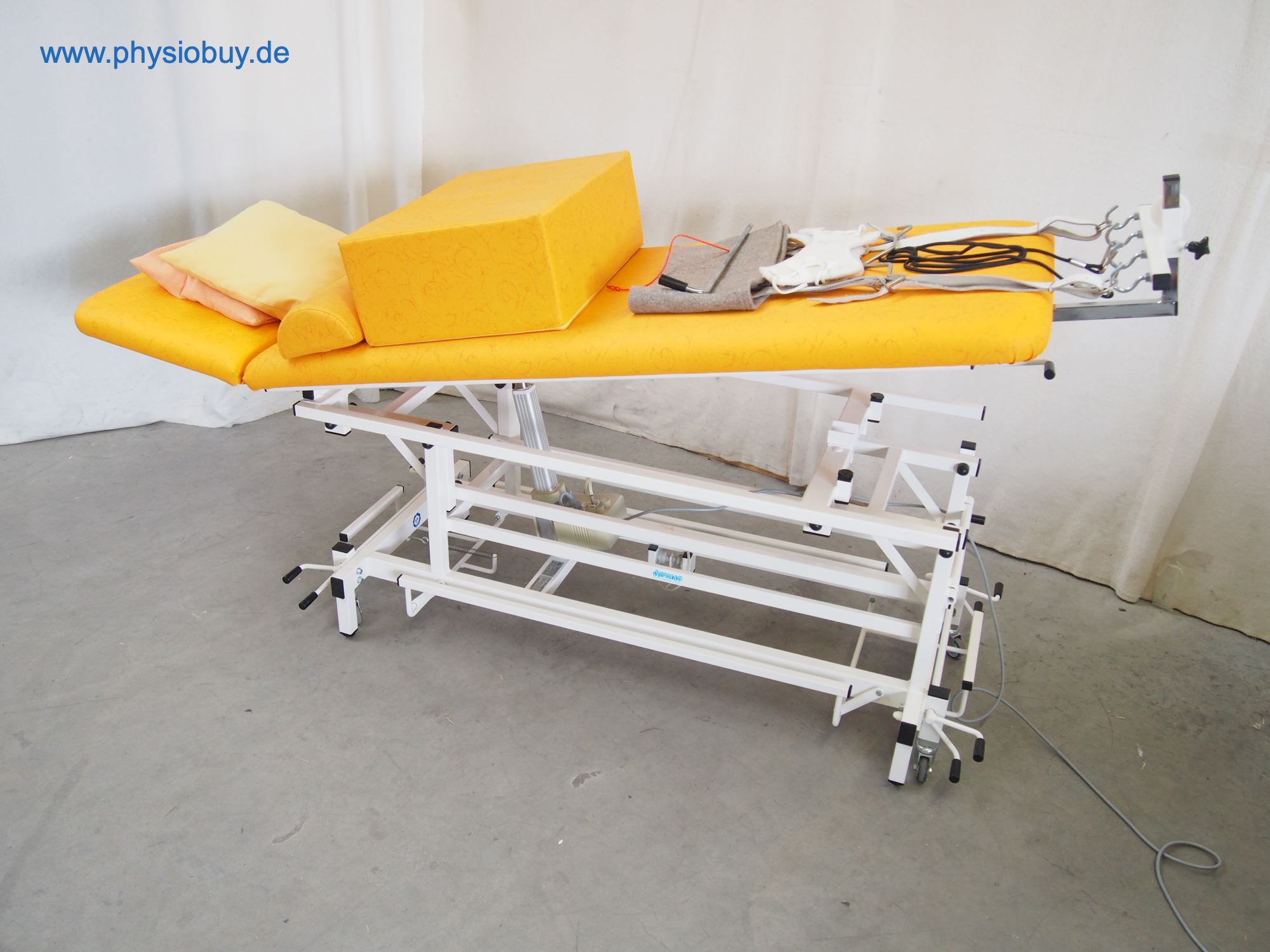Özpinar Extensionsliege elektrisch mit gelber Polsterung und Zubehör für HWS/LWS