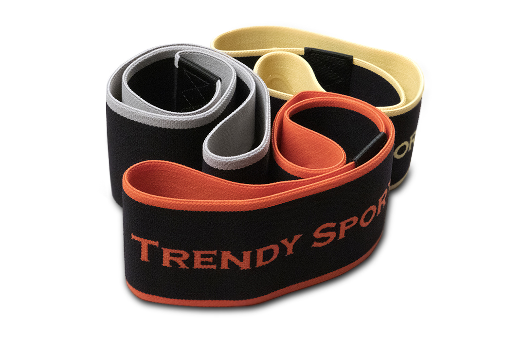Bündel aus vier Hip-Loop-Fitnessbändern in Grau, Beige, Orange und Schwarz