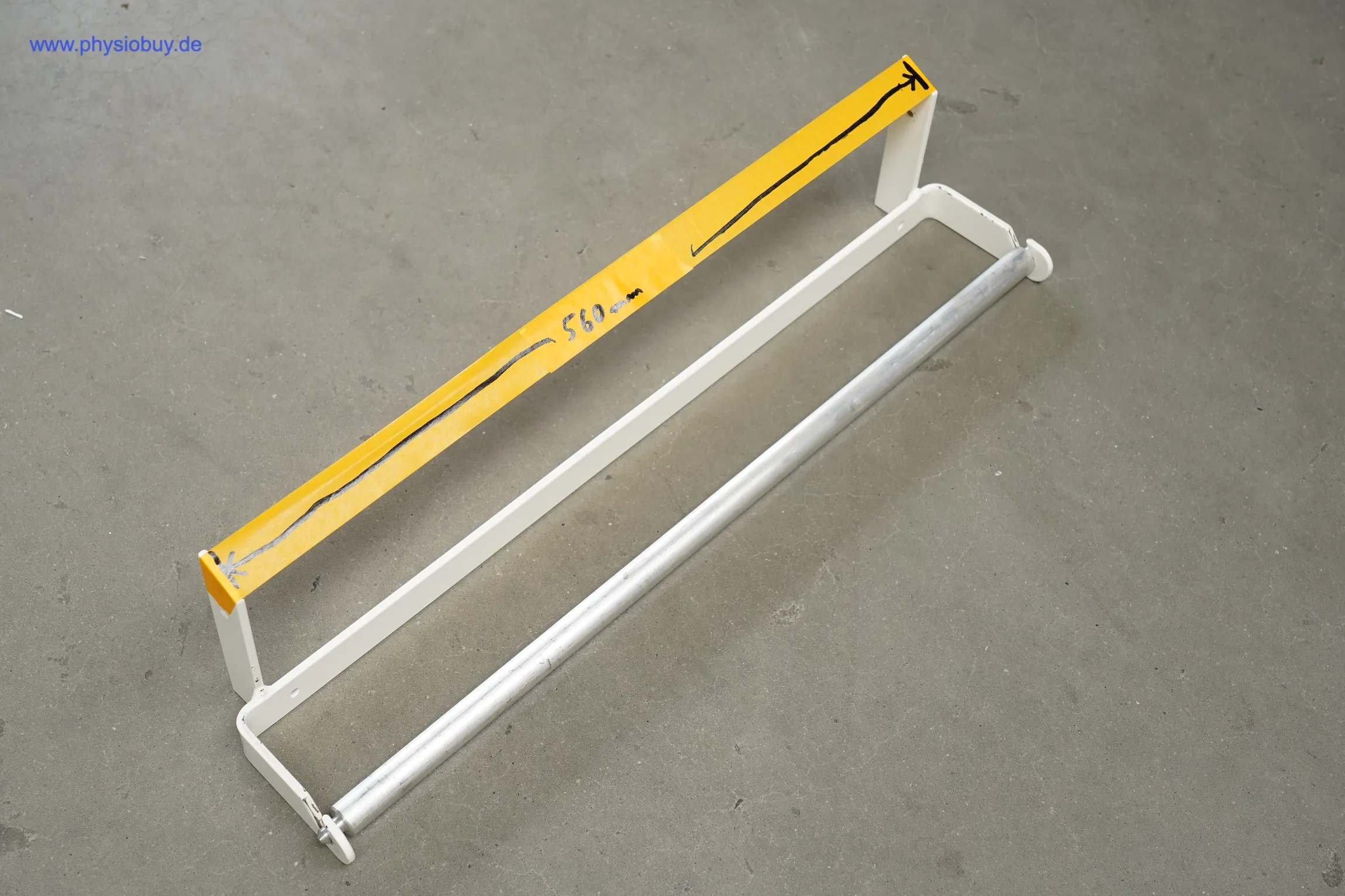 Papierrollenhalter für Behandlungsbank mit gelber Papierrolle