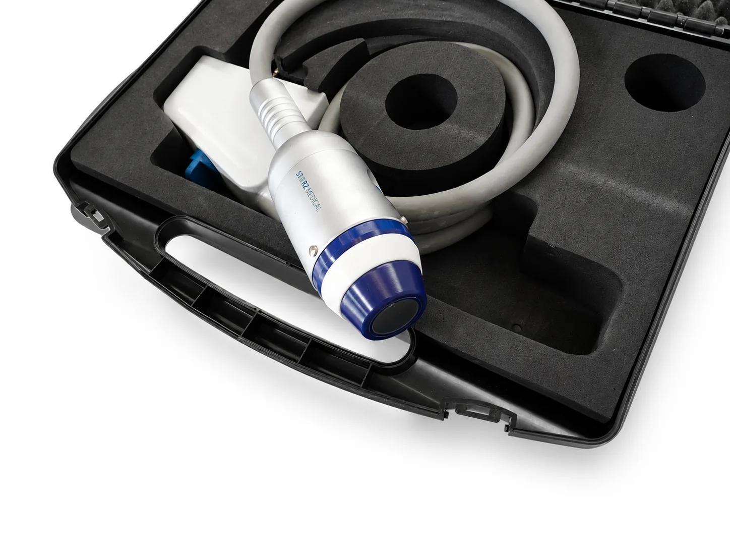 Handstück mit aufgewickeltem Kabel im Kunststoffkoffer, andere Perspektive